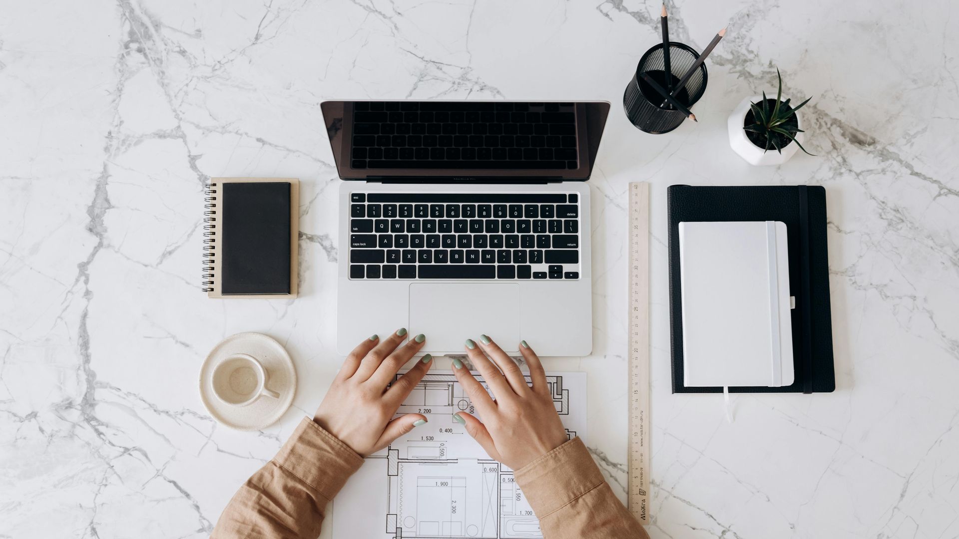 Small business person working on a laptop