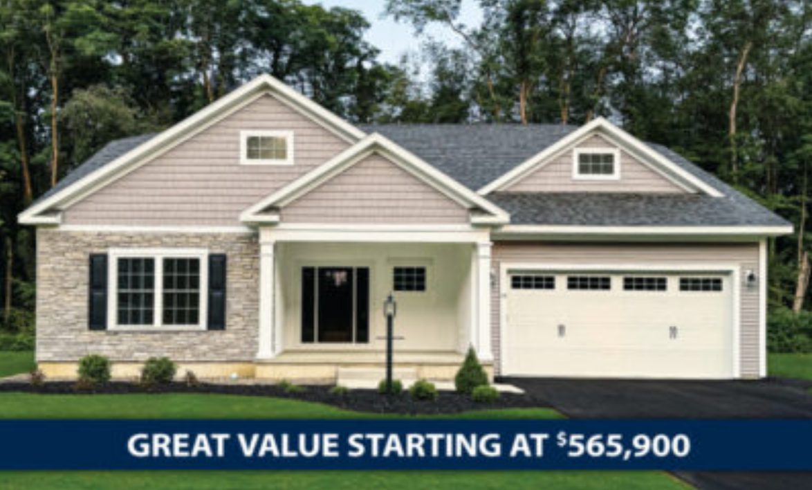 Ranch-style house with stone and siding facade, offering a great value, starting at $565,900.