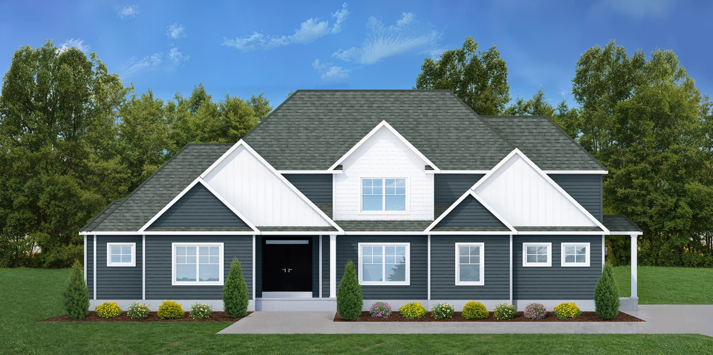 A modern house with dark gray siding, white trim, and a green roof stands in front of trees under a blue sky.
