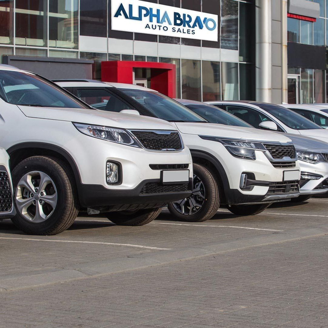 A row of cars are parked
