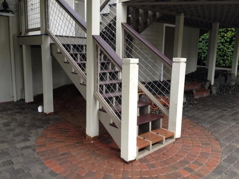 A set of stairs leading up to a house