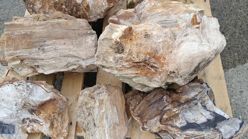 A pile of rocks sitting on top of a wooden pallet.