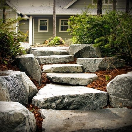 A set of stone steps leading up to a house