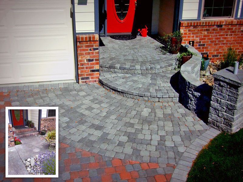 a picture of a brick walkway in front of a brick house
