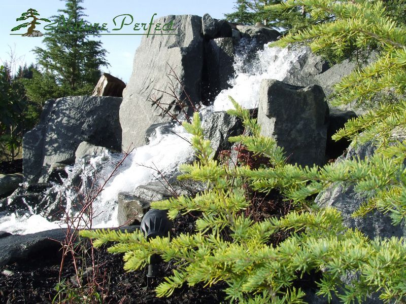 A waterfall with perfect written on the bottom