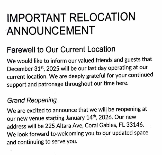 A picture of a building with a sign that says why are we moving.