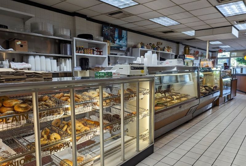 A bakery filled with lots of donuts and pastries.