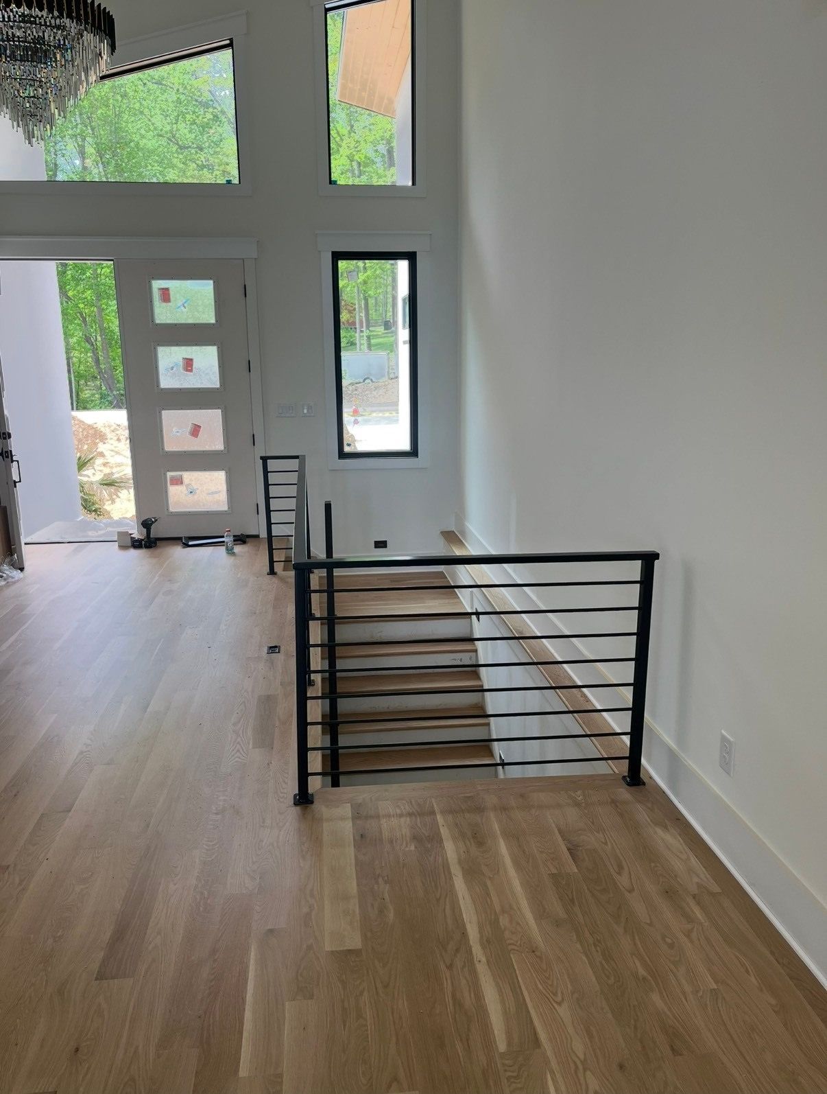 There is a staircase leading up to the second floor of a house.