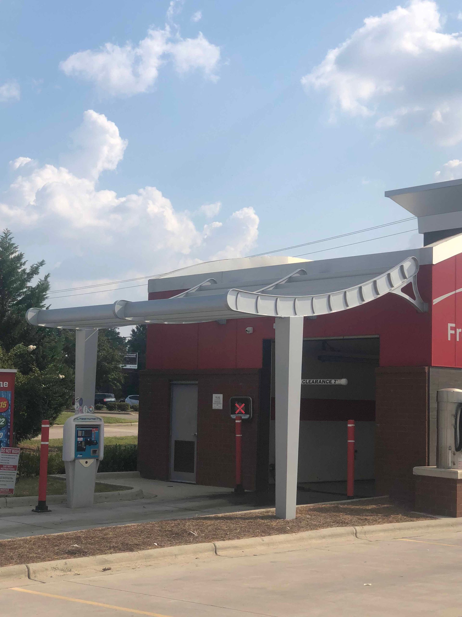 A red and white building with a sign that says free