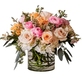 a vase filled with flowers on a white background .
