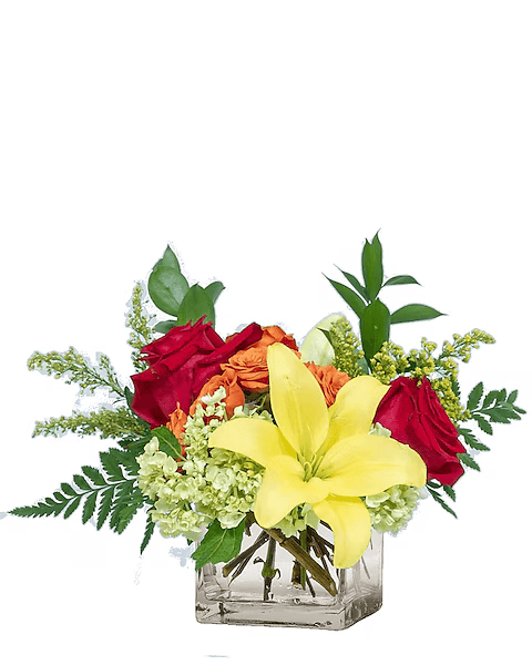 A vase filled with flowers and greenery on a white background.