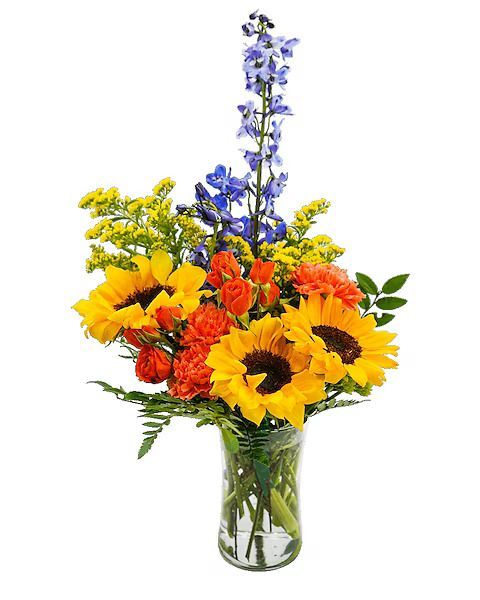 Vase of sunflowers, blue delphinium, yellow and orange flowers.