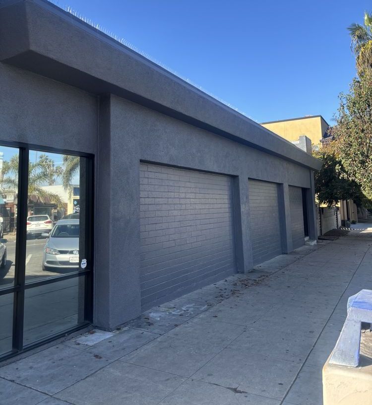 A building with a lot of cars parked in front of it