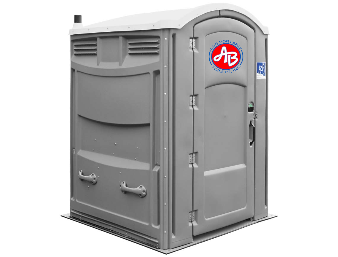 A portable toilet with a handicap sign on the door.