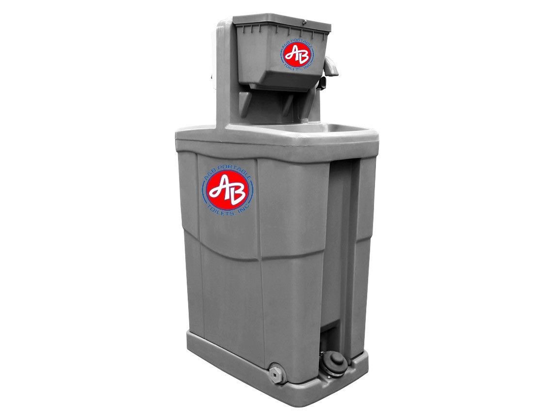 A portable sink with a faucet attached to it on a white background.