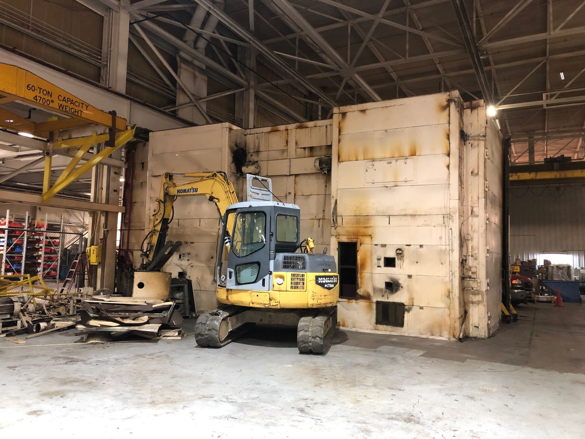 Yellow dump trucks and backhoes