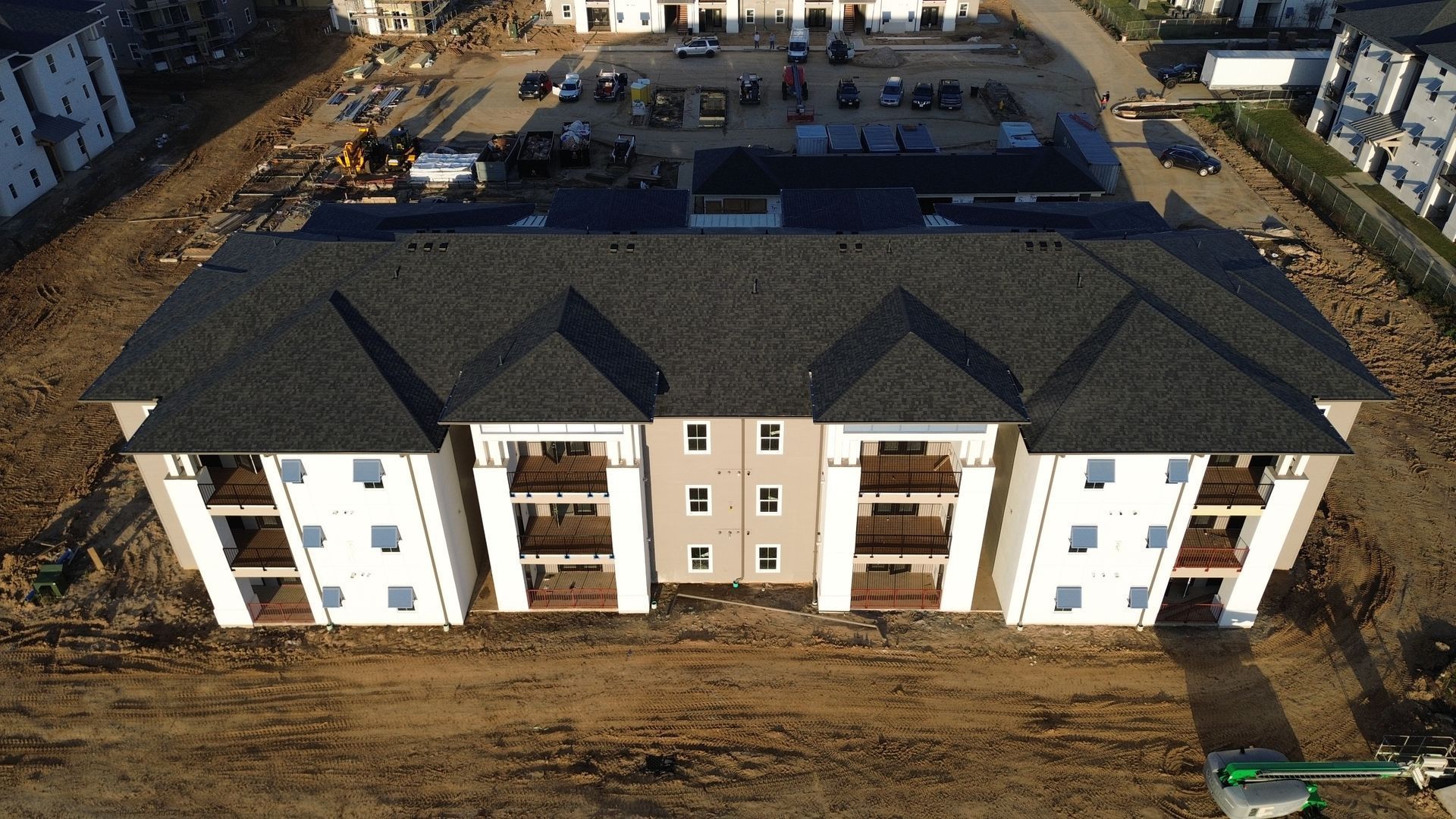 An aerial view of a large building under construction