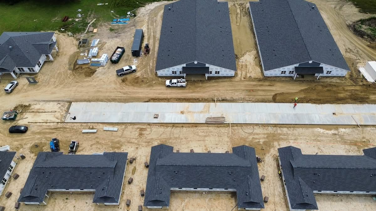 An aerial view of a construction site with a lot of buildings under construction.