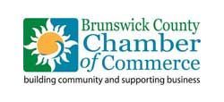 Logo of the Brunswick County Chamber of Commerce. It shows a sun in a green/blue square and text.