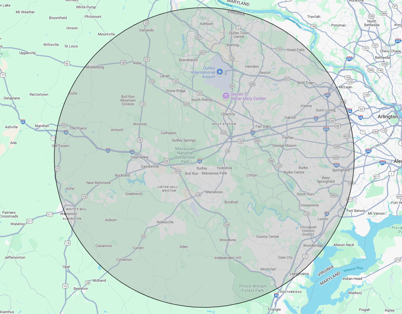 Map of a region, with a large gray circle overlay, indicating a geographic area around a city.