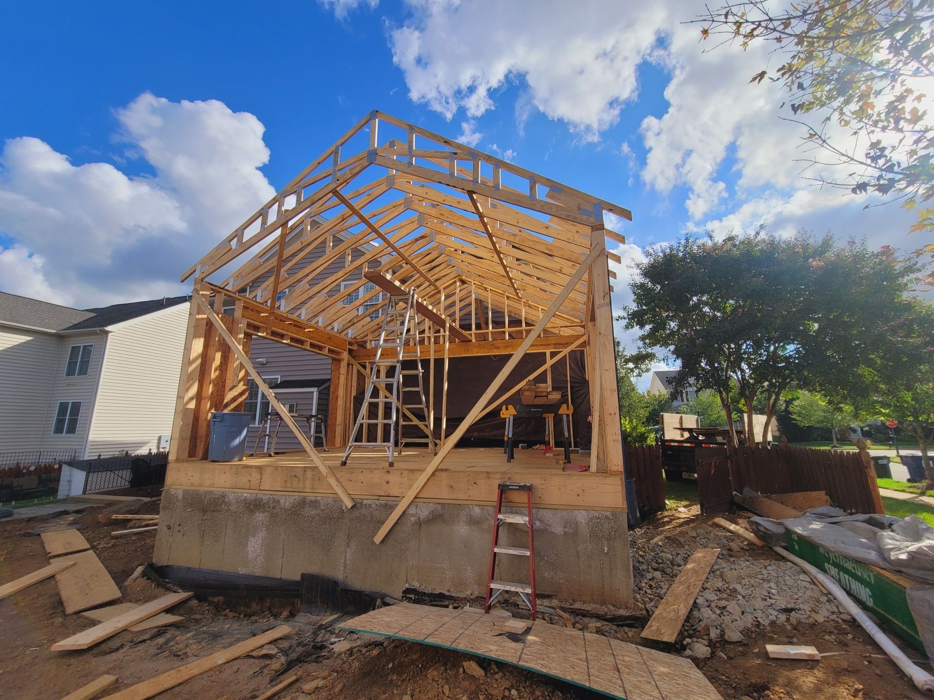 A house is being built with a wooden frame.