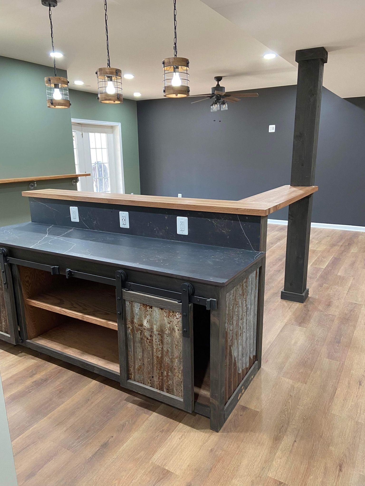 There is a bar in the middle of the room.