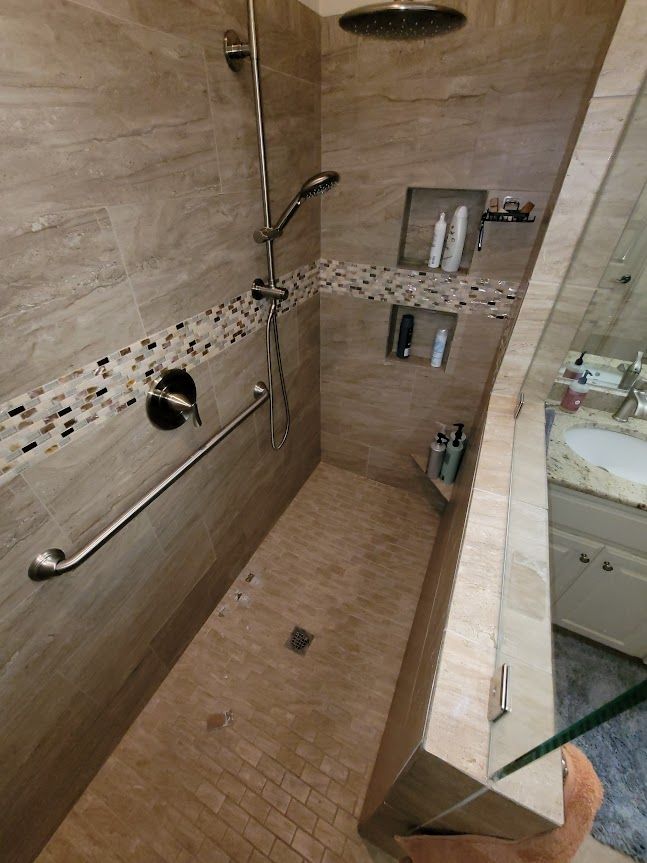 Walk-in shower with tiled floor