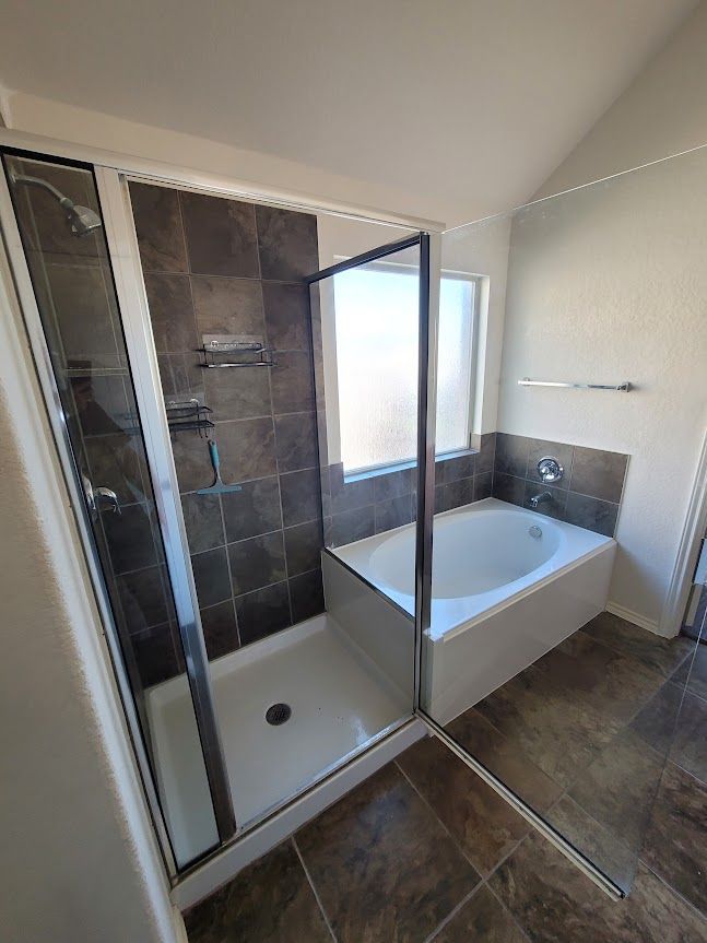 Walk-in shower with glass door