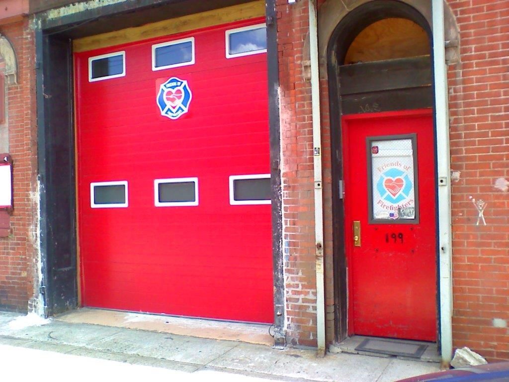 A red door with the number 119 on it