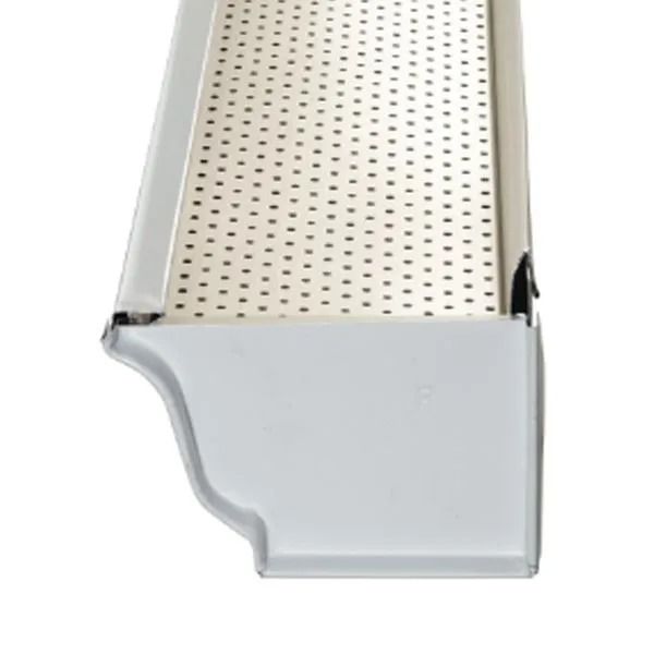 White perforated gutter guard on a white gutter, angled view.