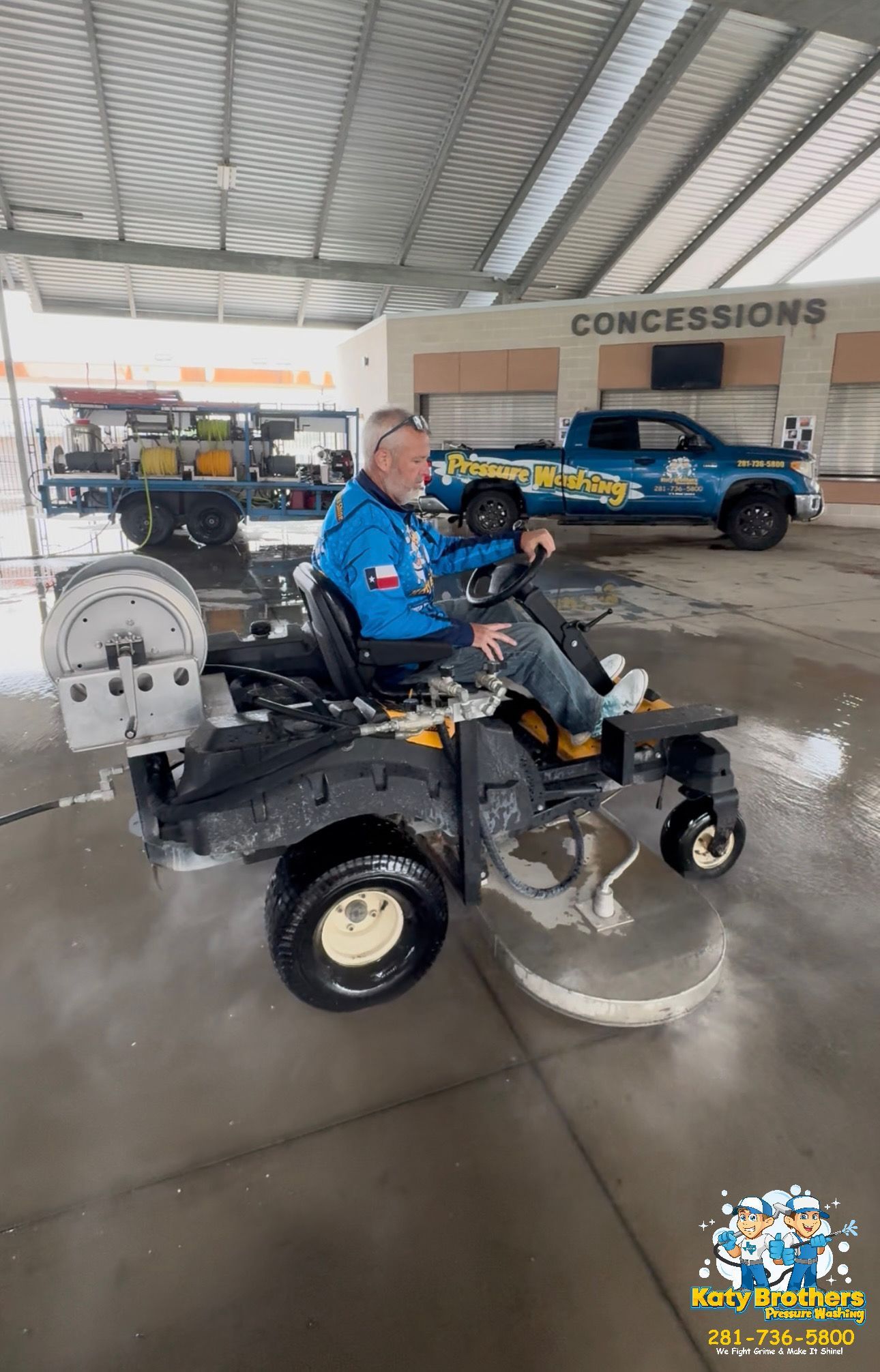 Person on a small utility vehicle indoors at a concession stand, with a blue truck in the background