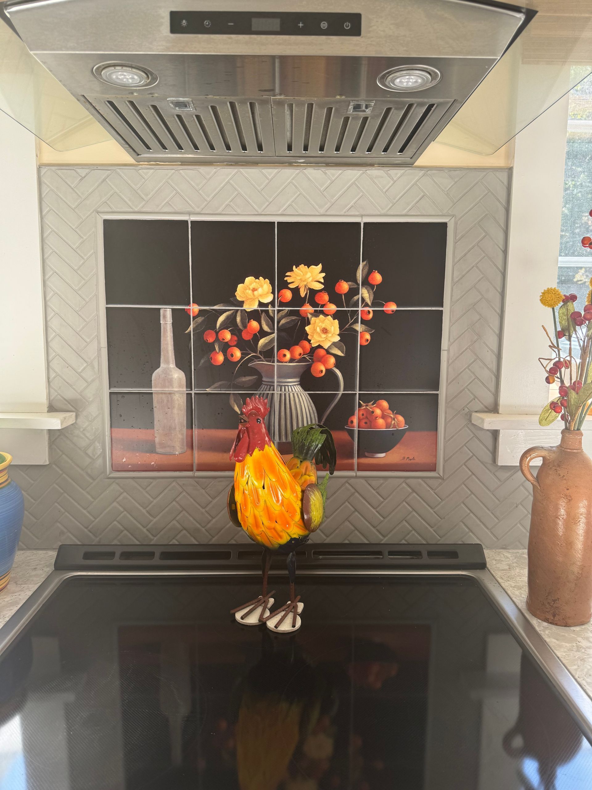 A stove top with backsplash