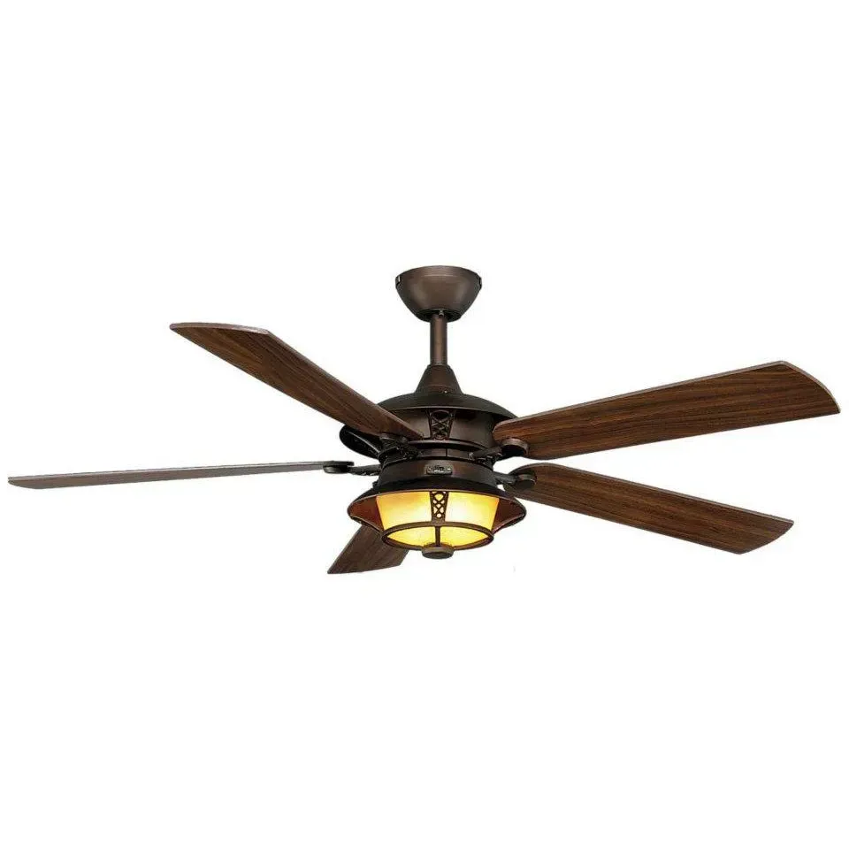 Brown ceiling fan with four wooden blades and a built-in light fixture on a white background