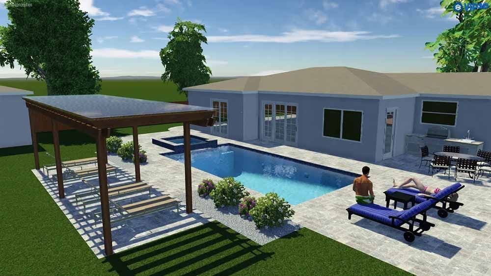 A man is sitting on a chair in front of a large swimming pool.