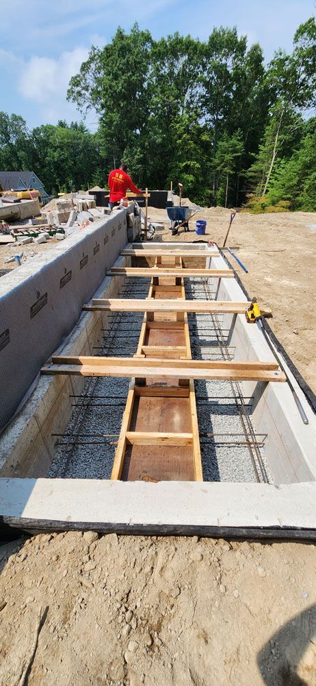 A concrete foundation is being built 