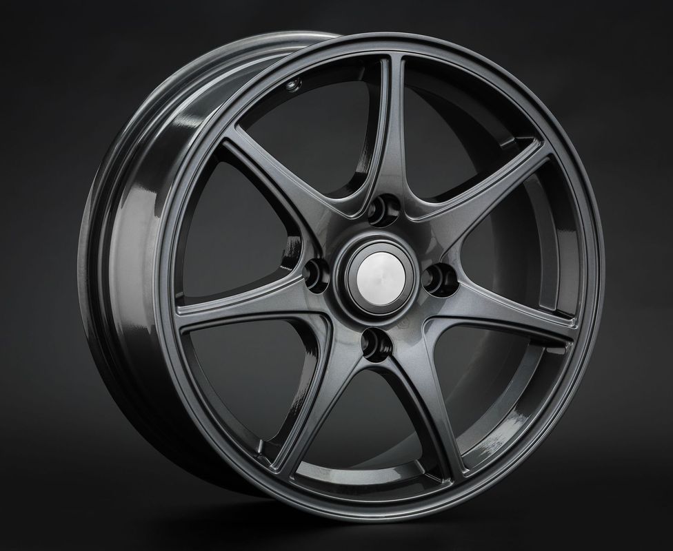 Dark gray alloy car wheel with five spokes, centered on a black background.