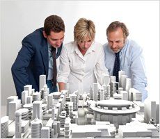 Architects viewing cityscape plan