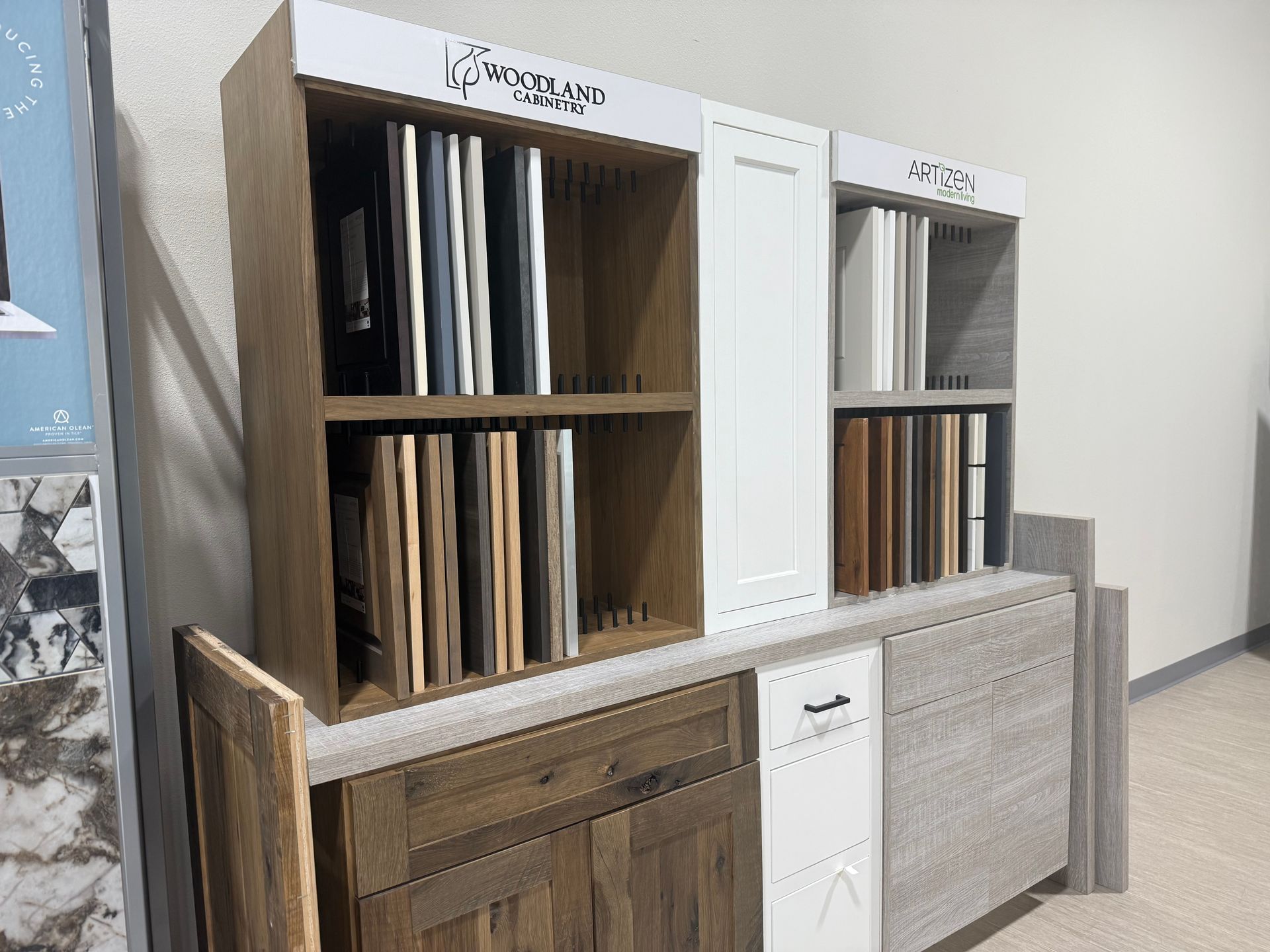 There are many different types of cabinets on display in this room.