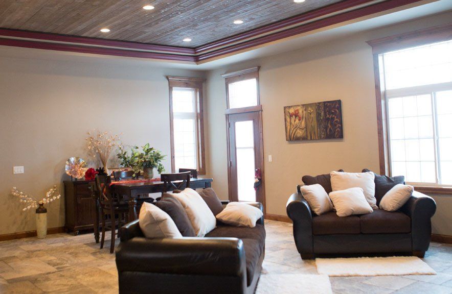 A living room with two couches and a table