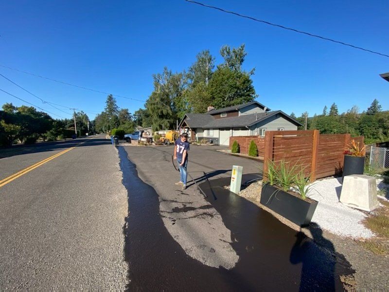 Seal coating driveway