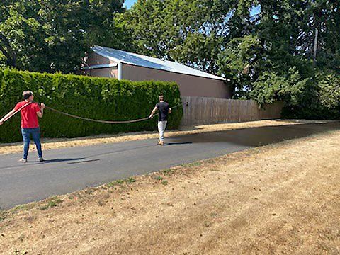 Seal coating driveway