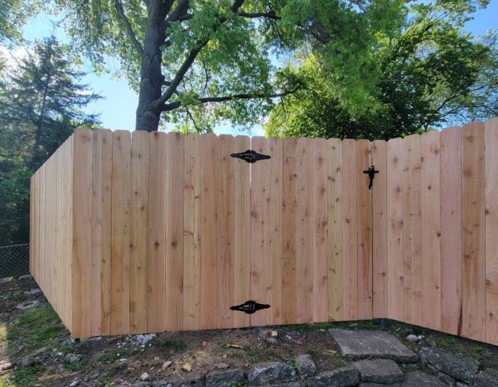 Wooden fence with a gate.