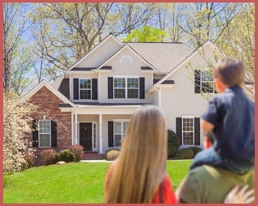 Suburban house with porch and green lawn