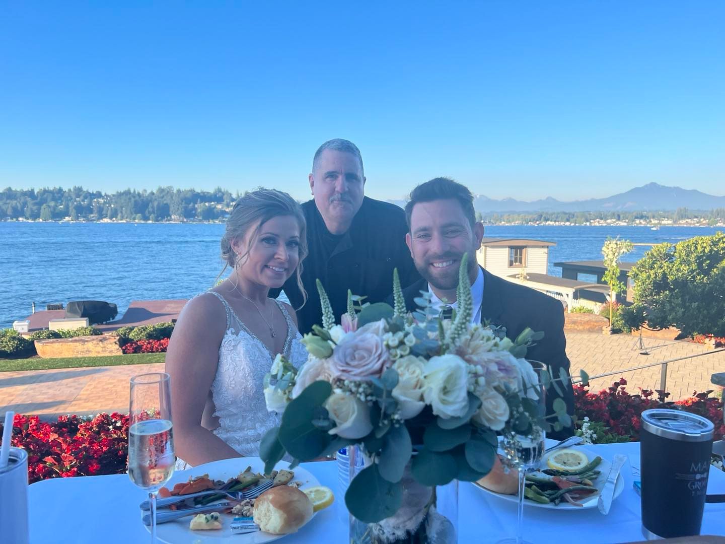 Caterer, bride and groom