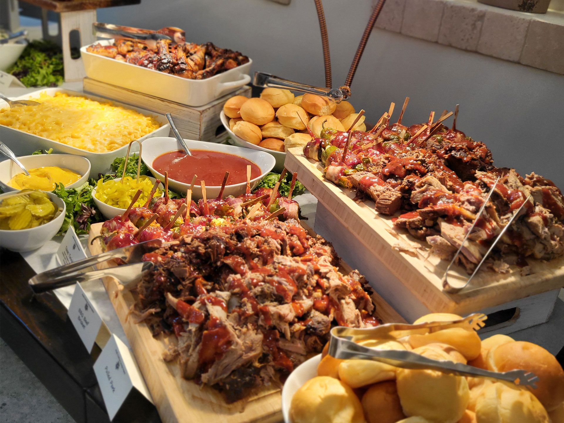 A buffet table with a lot of food on it