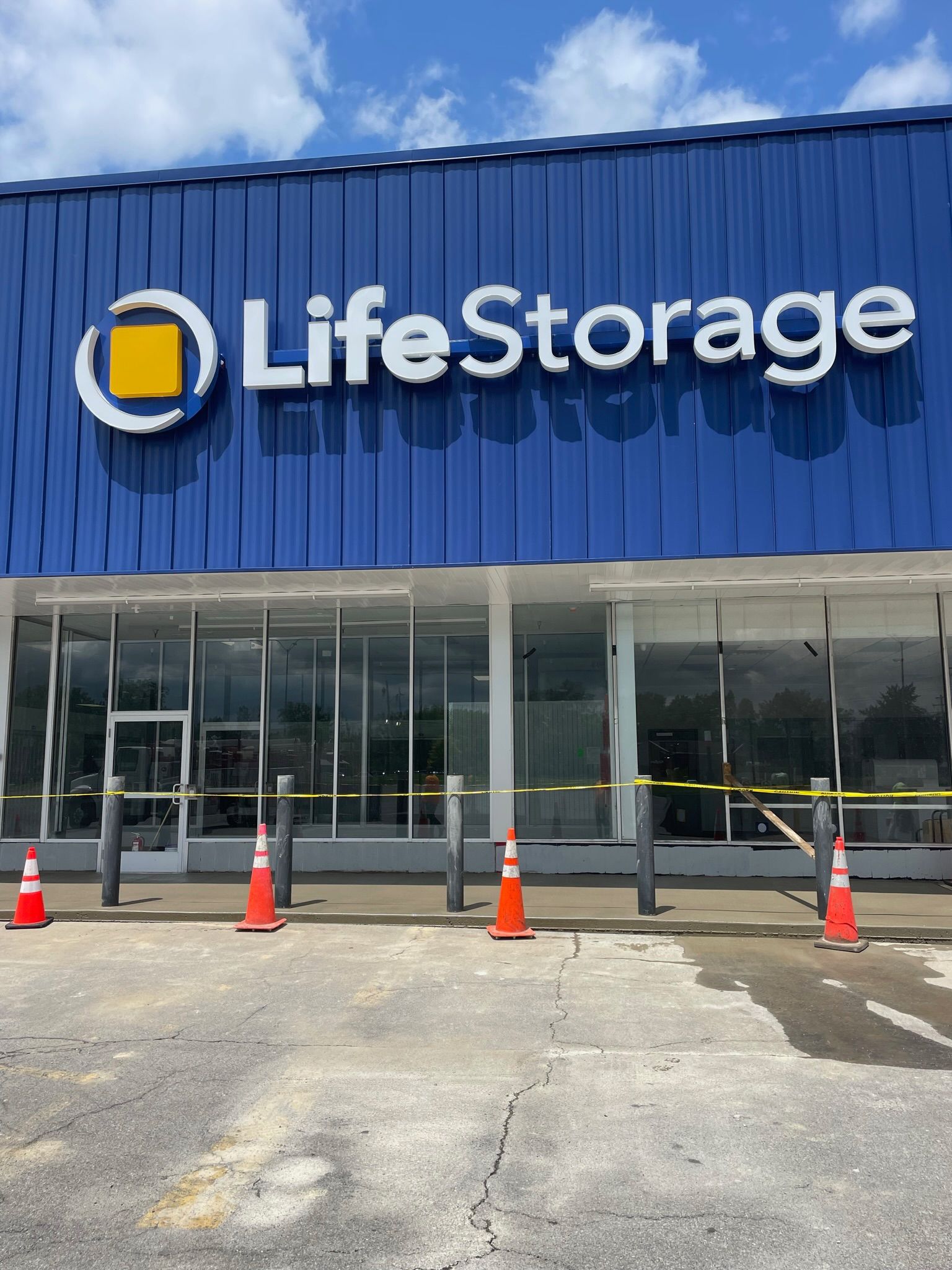 A blue building with the word life storage on it.