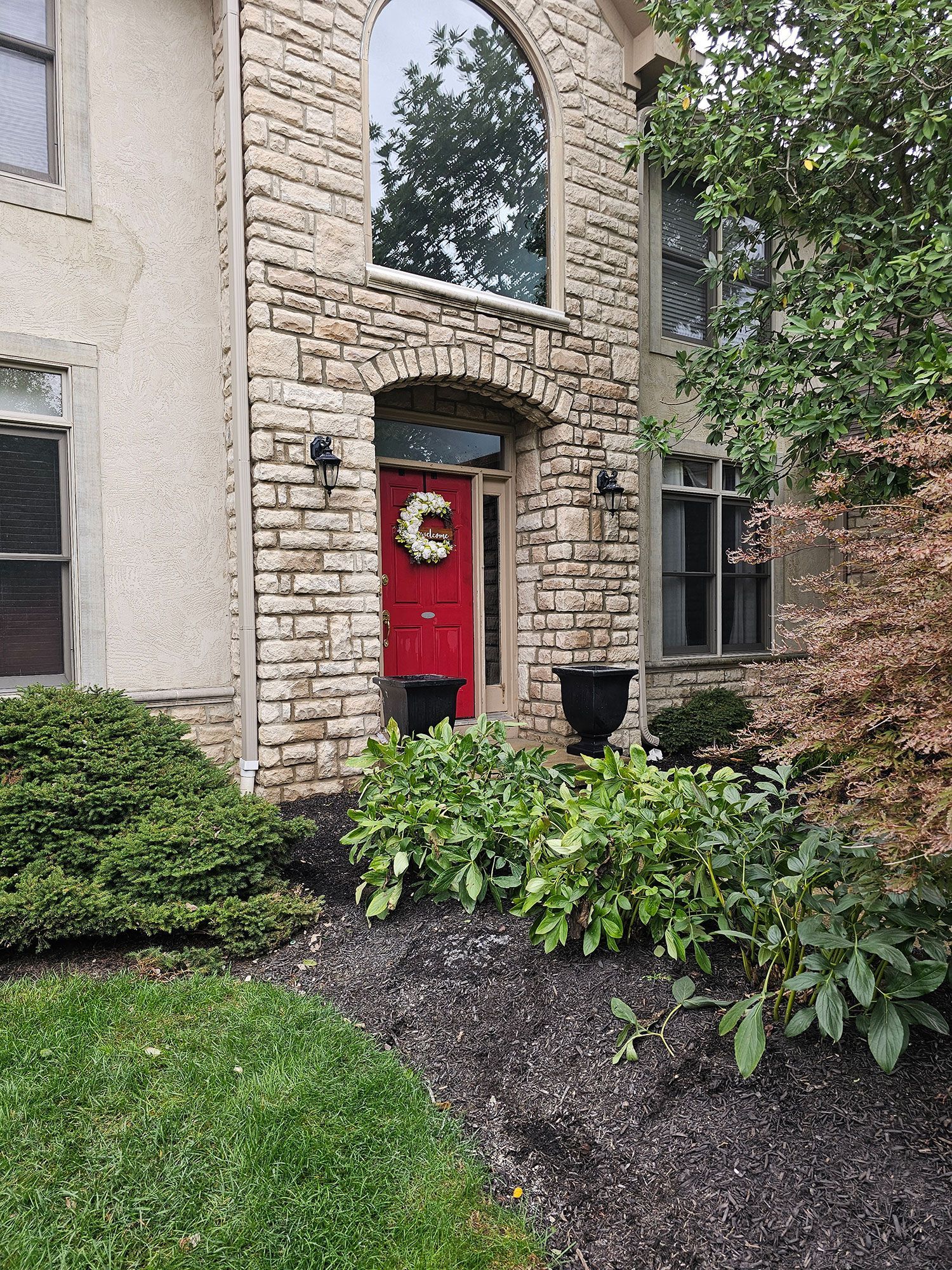 Residential home with stone wall facade