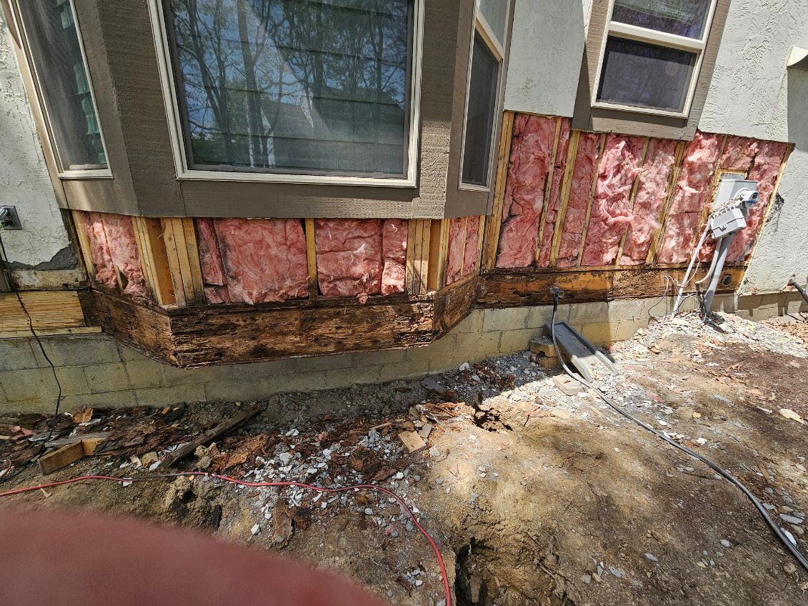 A house with a lot of insulation on the side of it