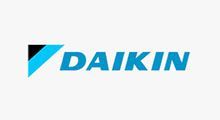 Daikin logo in blue text with a black and cyan geometric mark on a white background