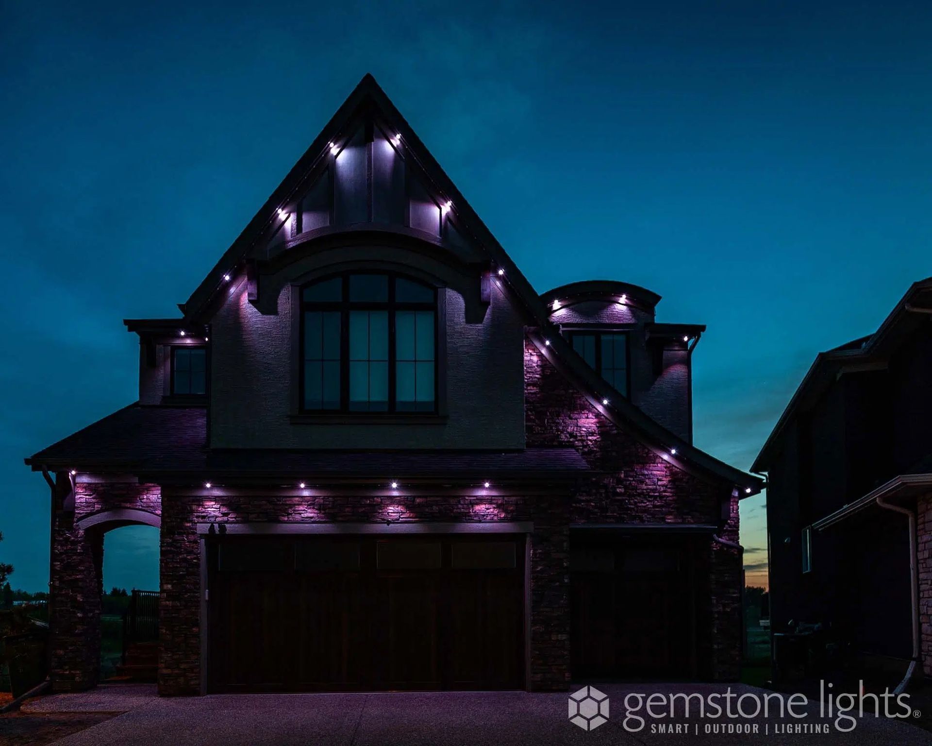 House exterior with holiday lighting